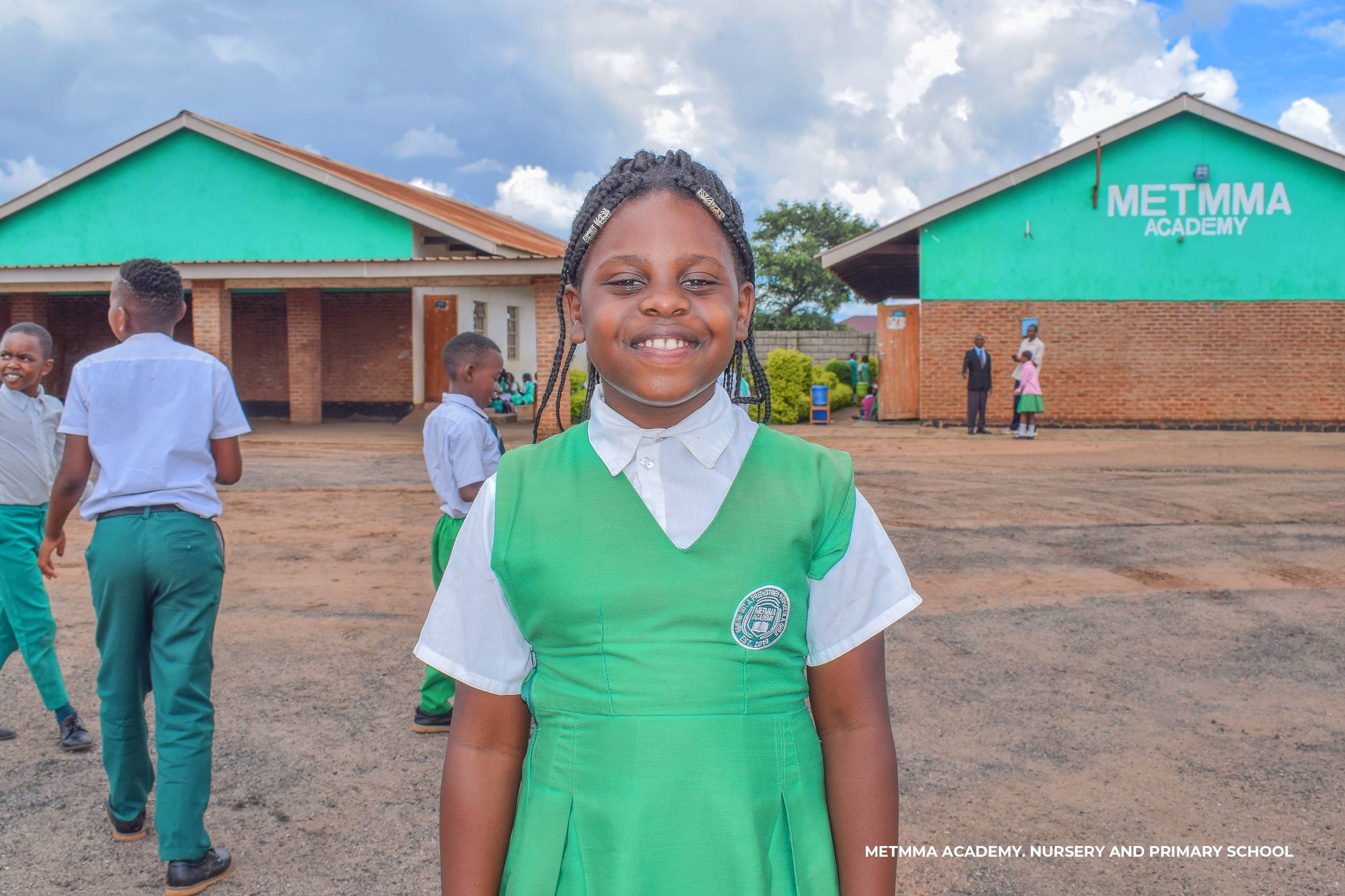 Happy METMMA students engaged in interactive classroom learning